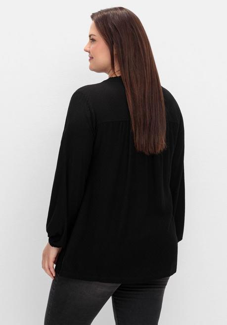 sheego Tunika mit V-Schlitz, Rüsche und Bindeband - schwarz sheego Bis zu 60% Rabatt