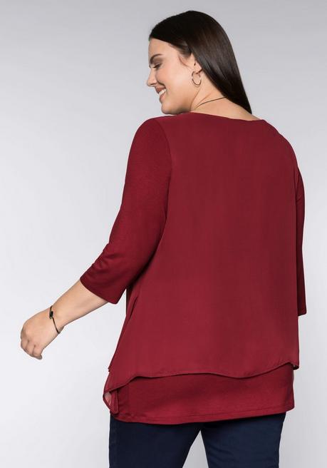 sheego Blusenshirt in leichter A-Linie mit Zipfelsaum - rubinrot sheego Fabrikpreis