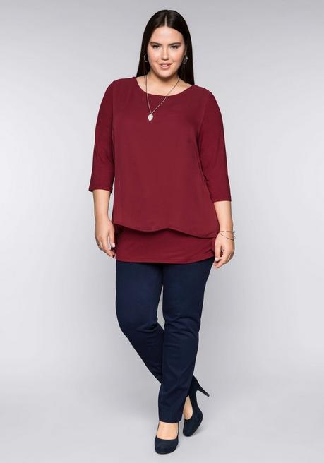 sheego Blusenshirt in leichter A-Linie mit Zipfelsaum - rubinrot sheego Fabrikpreis